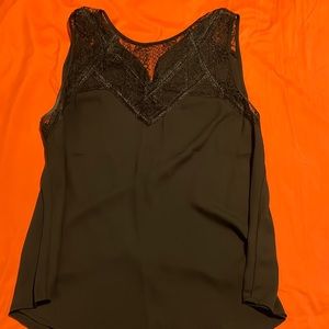 Black lacy sleeveless top.